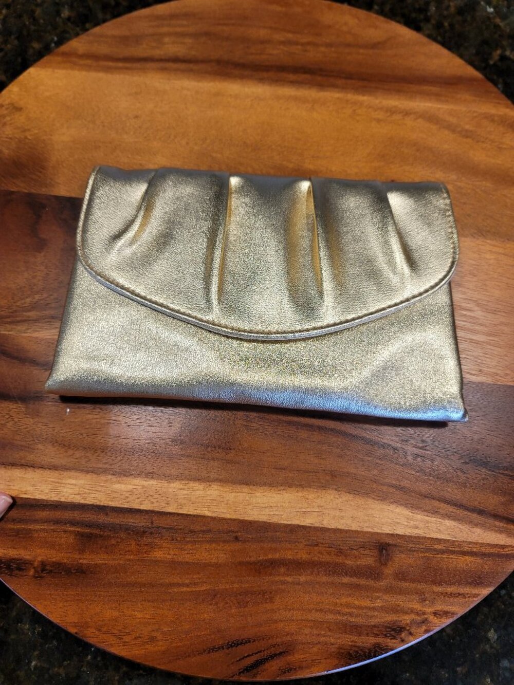 Gold colored clutch evening bag